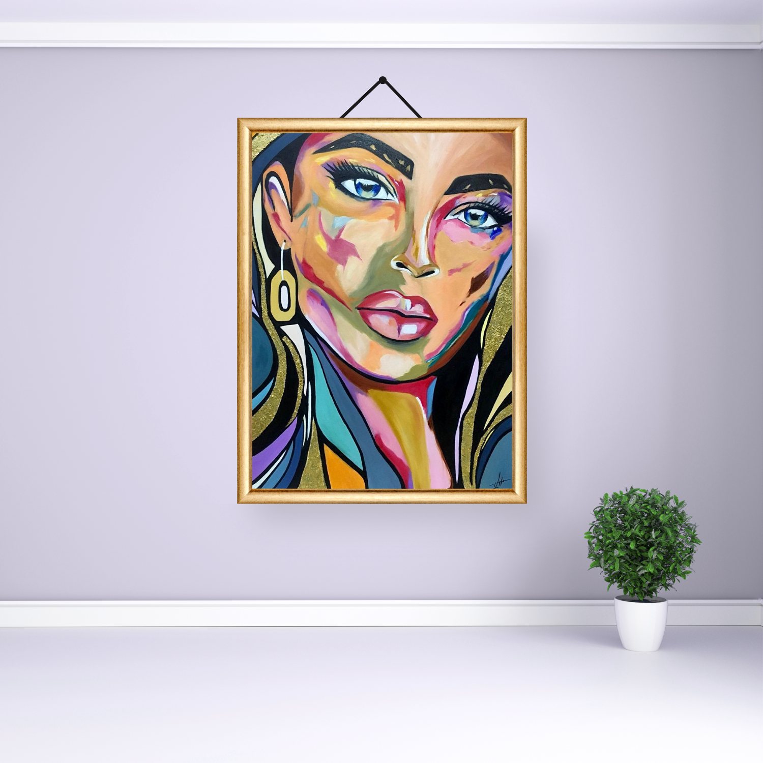 Striking acrylic artwork featuring a vivid portrait enhanced with gold leaf, showcasing dynamic colors.